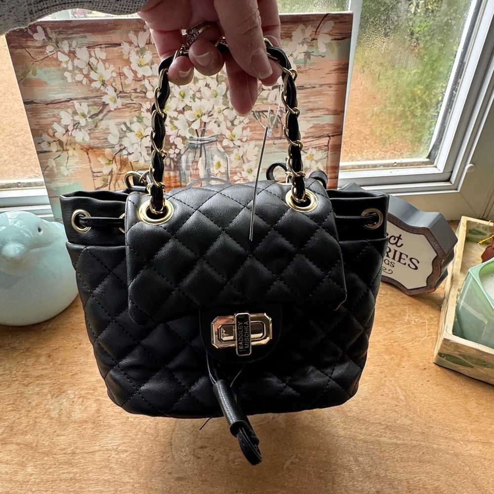 NWT Badgley Mischka Black Mini Quilted Backpack with gold hardware.
